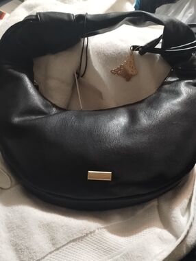 Jessica Simpson Black Hobo Bag with Gold Charm Accent